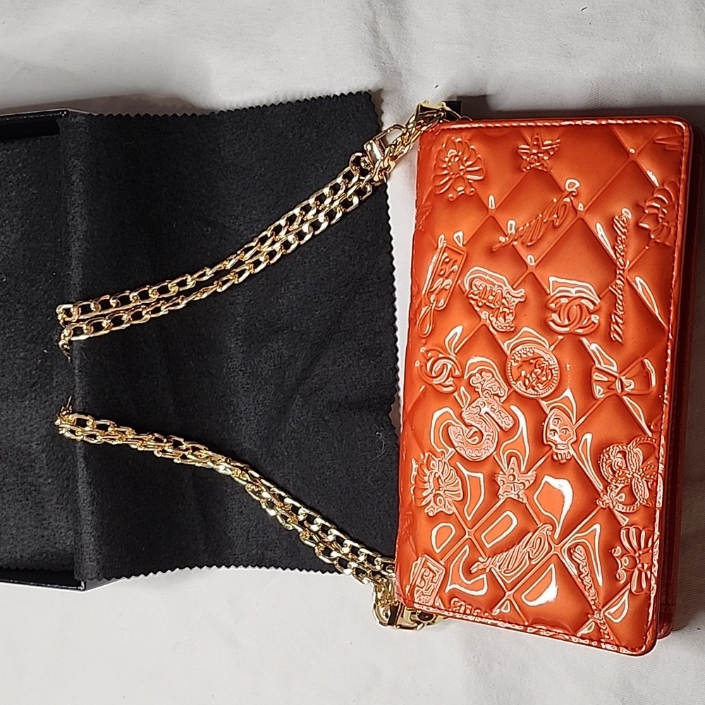 CHANEL Orange Quilted Chain Wallet